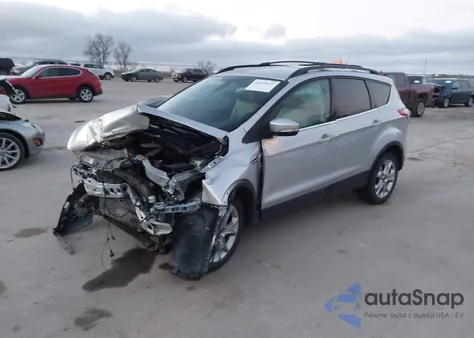 2013 Ford Escape Sel z USA, uszkodzony, nr VIN 1FMCU9H93DUD67073